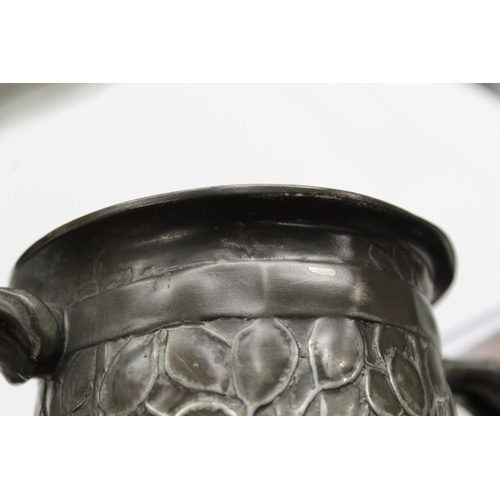 466 - Tudric pewter Art Nouveau twin handled loving cup by David Veazey for Liberty & Co., decorated w... 