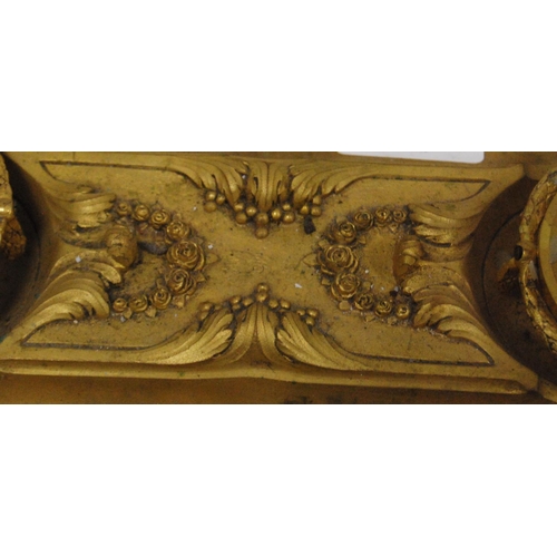 122 - Gilt metal desk stand with two integral inkwells, with two open quill wells and applied classical-st... 