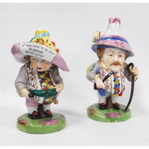 168 - Pair of early 20th century Royal Crown Derby Mansion House dwarf figures, both bearing slogans to th... 