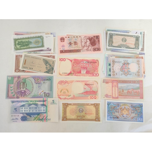 127 - Banknotes- Pristine world banknotes predominantly comprising of Asian issues and dating from the 197... 