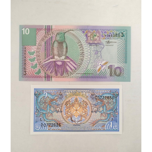 127 - Banknotes- Pristine world banknotes predominantly comprising of Asian issues and dating from the 197... 