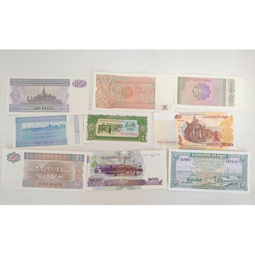 128 - Banknotes- Pristine world banknotes predominantly comprising of Asian issues. To include issues a Bu... 