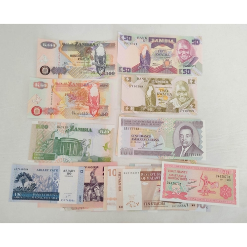 131 - Banknotes- Pristine world banknotes predominantly comprising of African issues dating from the 1956s... 