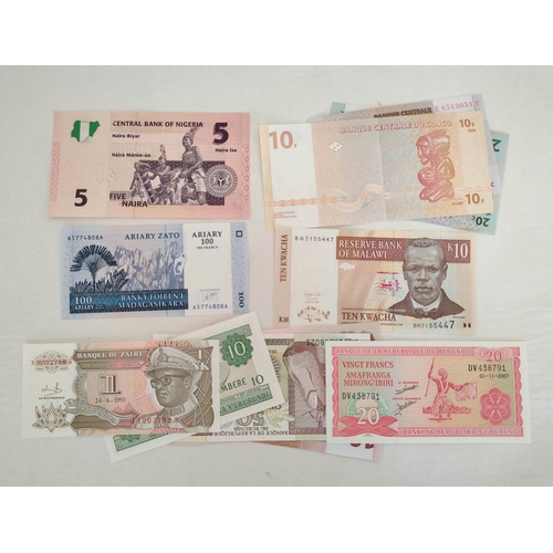 131 - Banknotes- Pristine world banknotes predominantly comprising of African issues dating from the 1956s... 