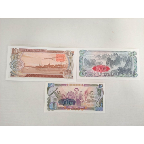 132 - Banknotes- Pristine world banknotes predominantly comprising of Asian issues and dating from the 197... 