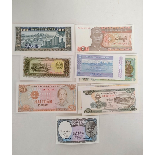 132 - Banknotes- Pristine world banknotes predominantly comprising of Asian issues and dating from the 197... 