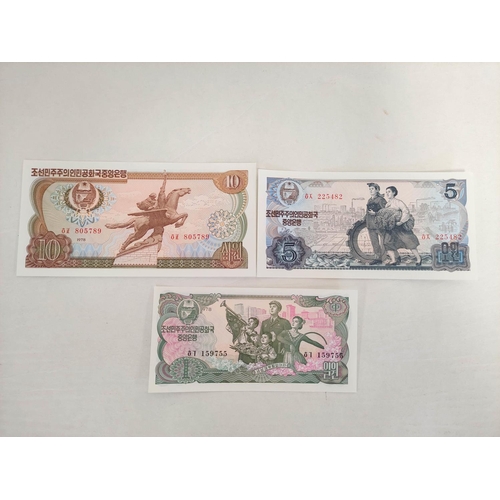 132 - Banknotes- Pristine world banknotes predominantly comprising of Asian issues and dating from the 197... 