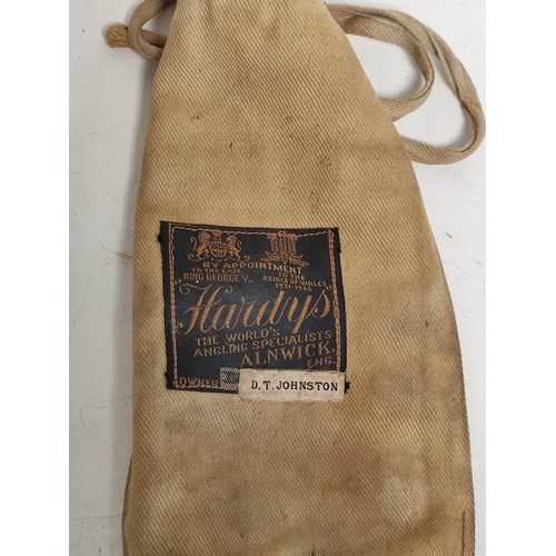 226 - Vintage Hardy's of Alnwick split cane trout rod in canvas bag. 9ft in length with screw locking sect... 