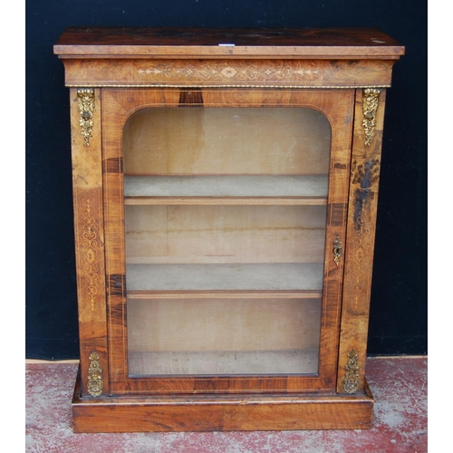 313 - 19th century French inlaid burr walnut pier cabinet, the inlaid frieze above a glazed door enclosing... 