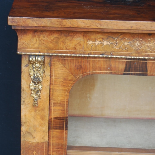 313 - 19th century French inlaid burr walnut pier cabinet, the inlaid frieze above a glazed door enclosing... 