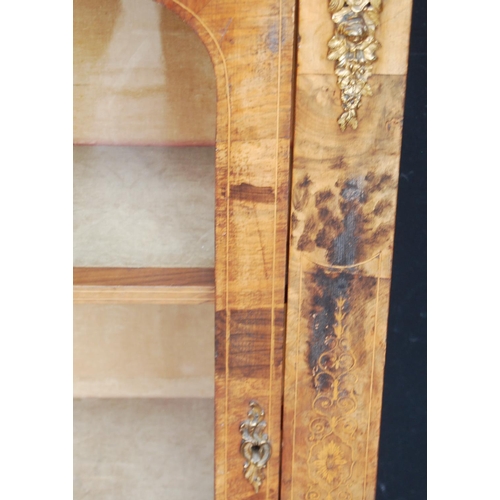 313 - 19th century French inlaid burr walnut pier cabinet, the inlaid frieze above a glazed door enclosing... 