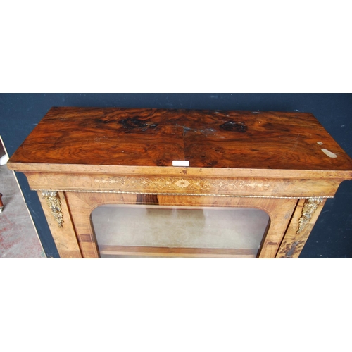 313 - 19th century French inlaid burr walnut pier cabinet, the inlaid frieze above a glazed door enclosing... 