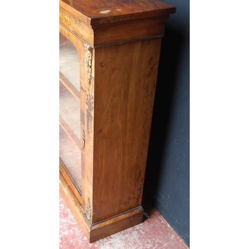 313 - 19th century French inlaid burr walnut pier cabinet, the inlaid frieze above a glazed door enclosing... 