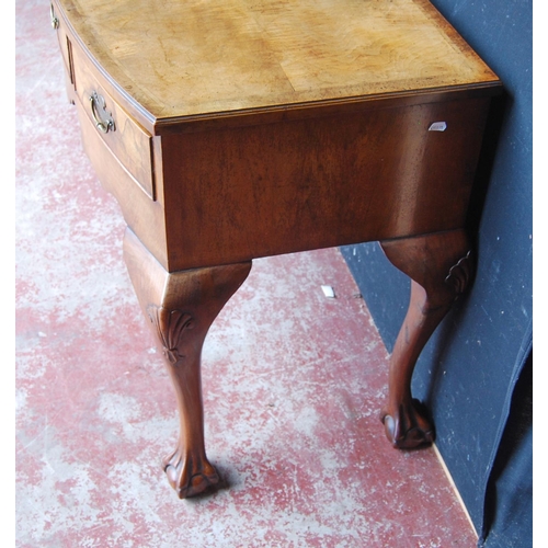 315 - Queen Anne-style walnut desk, with three short drawers above a shaped apron, on cabriole legs with b... 