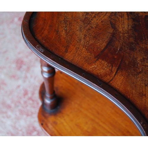 330 - 19th century mahogany window table, with two shaped tiers, on turned supports with brass castors, 75... 