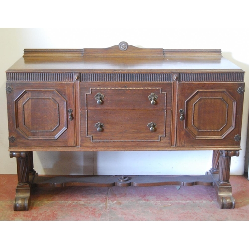 319 - Oak ten-piece dining room suite, comprising a sideboard, pull-out extending dining table and eight c... 