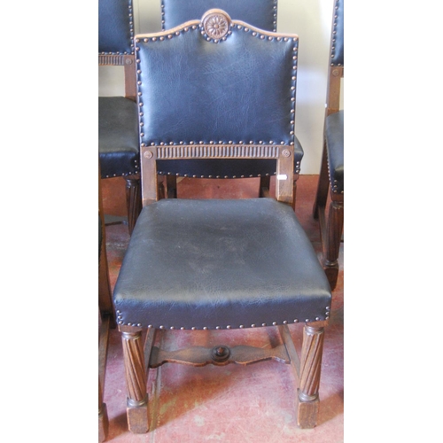 319 - Oak ten-piece dining room suite, comprising a sideboard, pull-out extending dining table and eight c... 