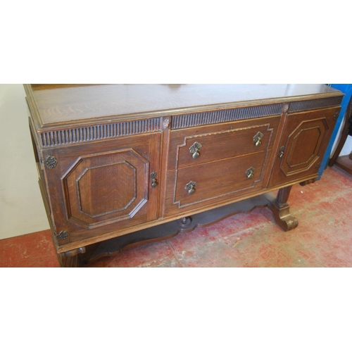 319 - Oak ten-piece dining room suite, comprising a sideboard, pull-out extending dining table and eight c... 