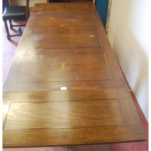 319 - Oak ten-piece dining room suite, comprising a sideboard, pull-out extending dining table and eight c... 