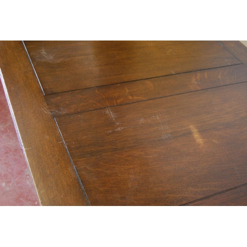 319 - Oak ten-piece dining room suite, comprising a sideboard, pull-out extending dining table and eight c... 