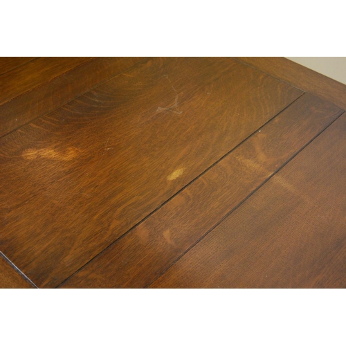 319 - Oak ten-piece dining room suite, comprising a sideboard, pull-out extending dining table and eight c... 