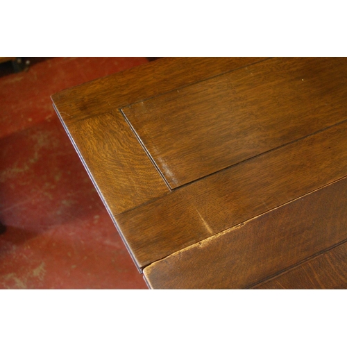 319 - Oak ten-piece dining room suite, comprising a sideboard, pull-out extending dining table and eight c... 