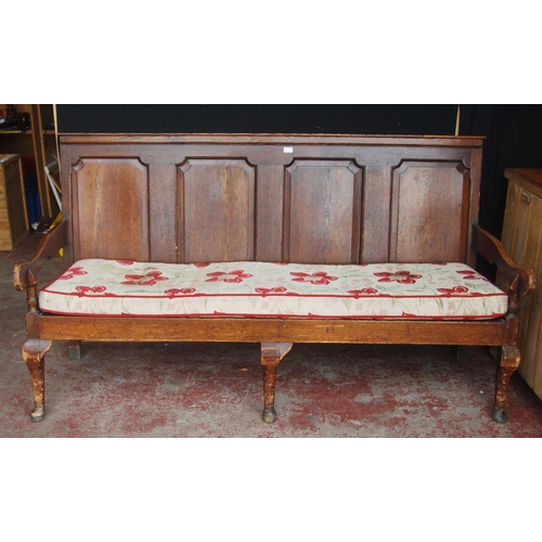 321 - Early 19th century oak hall bench, with a four-section panelled back above a later slatted seat, wit... 