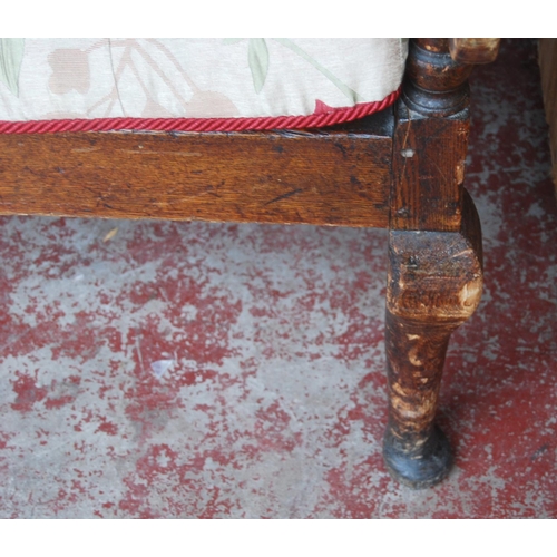 321 - Early 19th century oak hall bench, with a four-section panelled back above a later slatted seat, wit... 