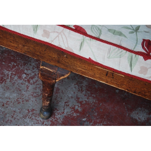 321 - Early 19th century oak hall bench, with a four-section panelled back above a later slatted seat, wit... 