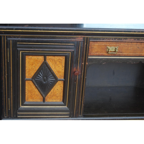 323 - Late 19th century Aesthetic Movement ebonised and walnut drawing room cabinet, the top section with ... 