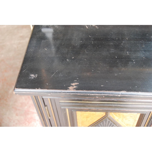 323 - Late 19th century Aesthetic Movement ebonised and walnut drawing room cabinet, the top section with ... 