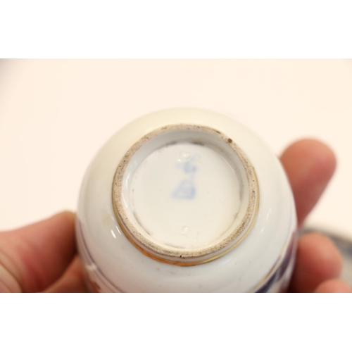 14 - Antique cup and saucer with tobacco leaf style pattern.