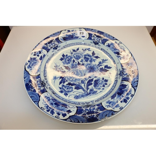 23 - Delft floral decorated charger, 34cm diameter.