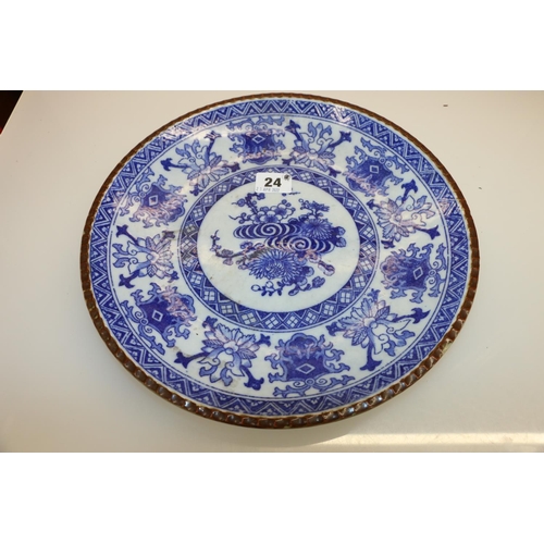 24 - Oriental blue and white floral decorated dish, 30cm diameter.