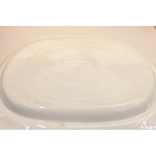 25 - Two antique transfer printed ashets decorated with figures by a river, largest measures 48.5cm wide.... 