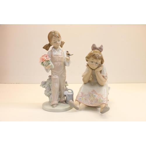 3 - Lladro model of a girl holding flowers and a bird, 18cm, and another of a girl seated on a stool.  1... 