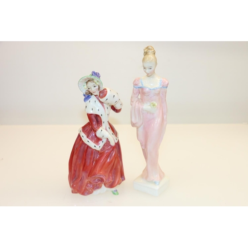 35 - Two Royal Doulton figures to include Christmas Morn and Daphne.