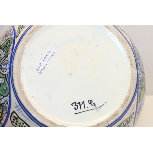 38 - Scottish Pottery jardiniere or vase decorated with birds and flowers, 19cm.