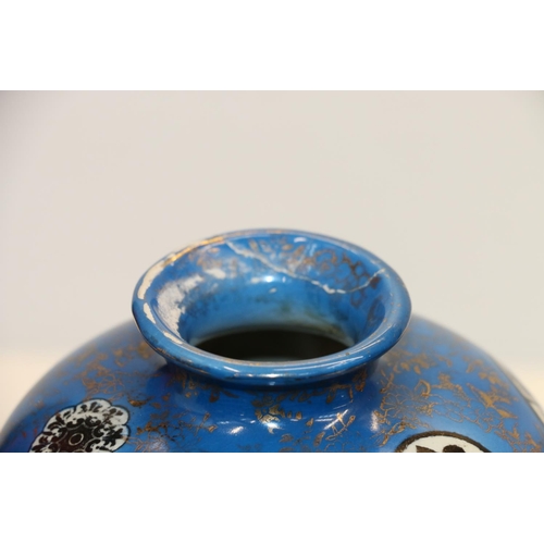 48 - Pair of Fenton blue ground vases decorated with floral gilt pattern and geometric roundels, 21cm.