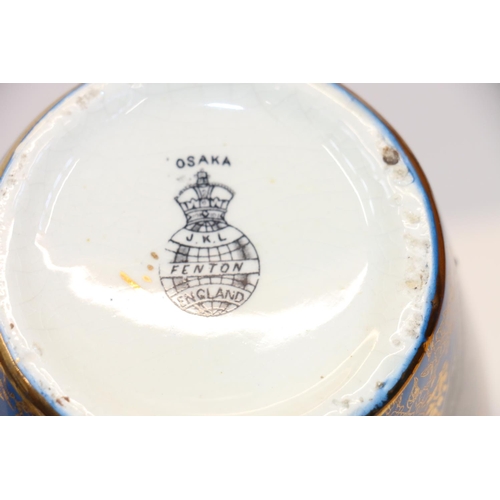 48 - Pair of Fenton blue ground vases decorated with floral gilt pattern and geometric roundels, 21cm.