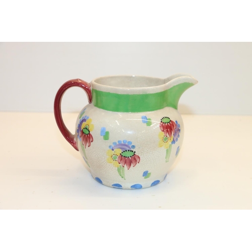 51 - Richard Amour for Bough Pottery floral decorated jug, 11.5cm.