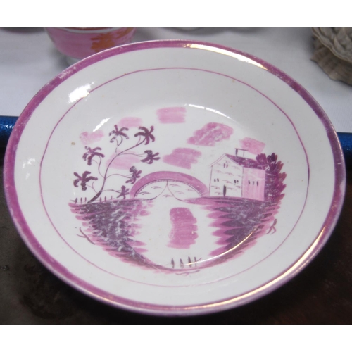 172 - Collection of Victorian Sutherland lustre teawares comprising a red lustre decorated plate, porridge... 