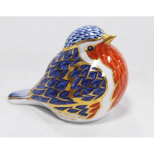 173 - Four Royal Crown Derby animal paperweights modelled as a robin redbreast, horse, rabbit and another ... 