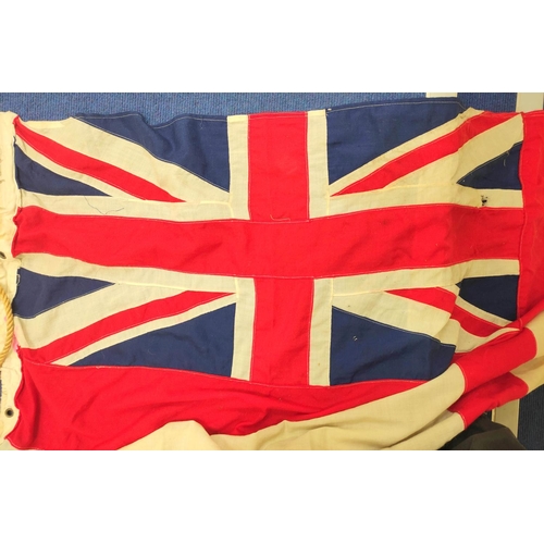 440 - Royal White Ensign flag from HMS Hood together with a plaque depicting a bird with anchor in claw wi... 