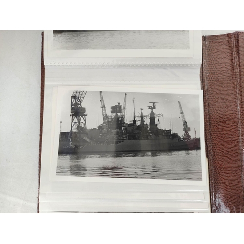 440 - Royal White Ensign flag from HMS Hood together with a plaque depicting a bird with anchor in claw wi... 