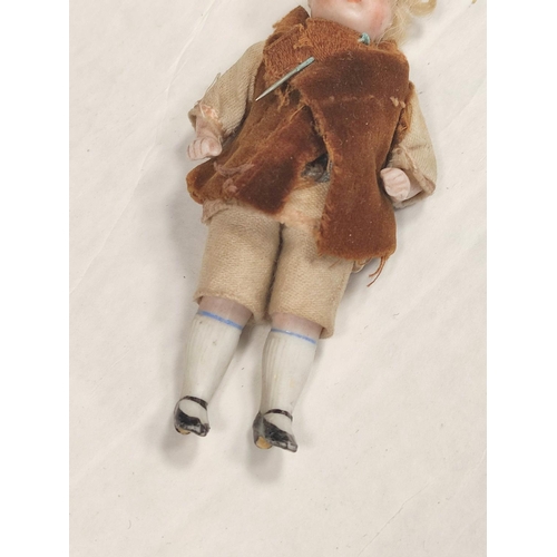 2 - Two 19th century Victorian porcelain child's dolls with applied painted features. (2)