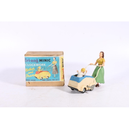 12 - Triang Mini clockwork Mother and Pram automaton model, boxed. 