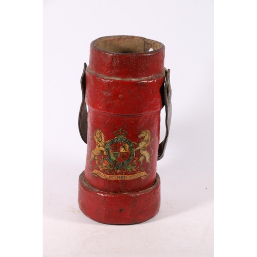 435 - WWI era painted leather shell carrier with royal arms 'Dieu Et Mon Droit', 33cm tall. 