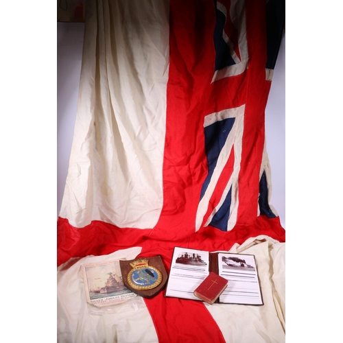 440 - Royal White Ensign flag from HMS Hood together with a plaque depicting a bird with anchor in claw wi... 