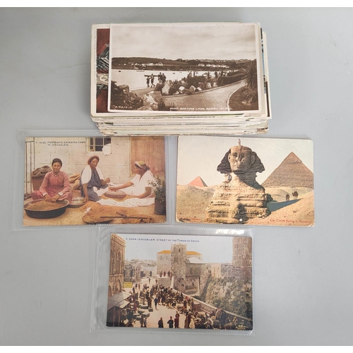 194 - Carton containing over 400 early 20th century postcards mostly of British and world topographical su... 
